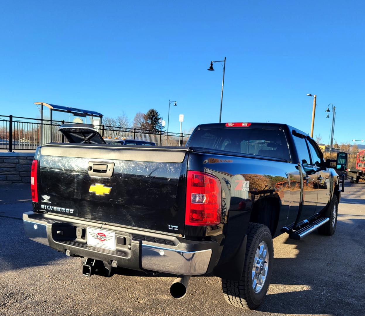 2014 Black /Black Chevrolet Silverado 2500HD LTZ (1GC1KYE87EF) with an 6.6L Duramax V8 engine, Allison Automatic transmission, located at 450 N Russell, Missoula, MT, 59801, (406) 543-6600, 46.874496, -114.017433 - Beast of a Truck. 1 Owner. Duramax Diesel. Allison Transmission. 4 Wheel Drive. Crewcab. Longbox. Power Sunroof. Running Boards. Air. Cruise. Tilt. Power Leather Seats. Heats Seats. Dual Climate Control. Tonneau Cover. Gooseneck Ball. Like NEW Tires. - Photo#7